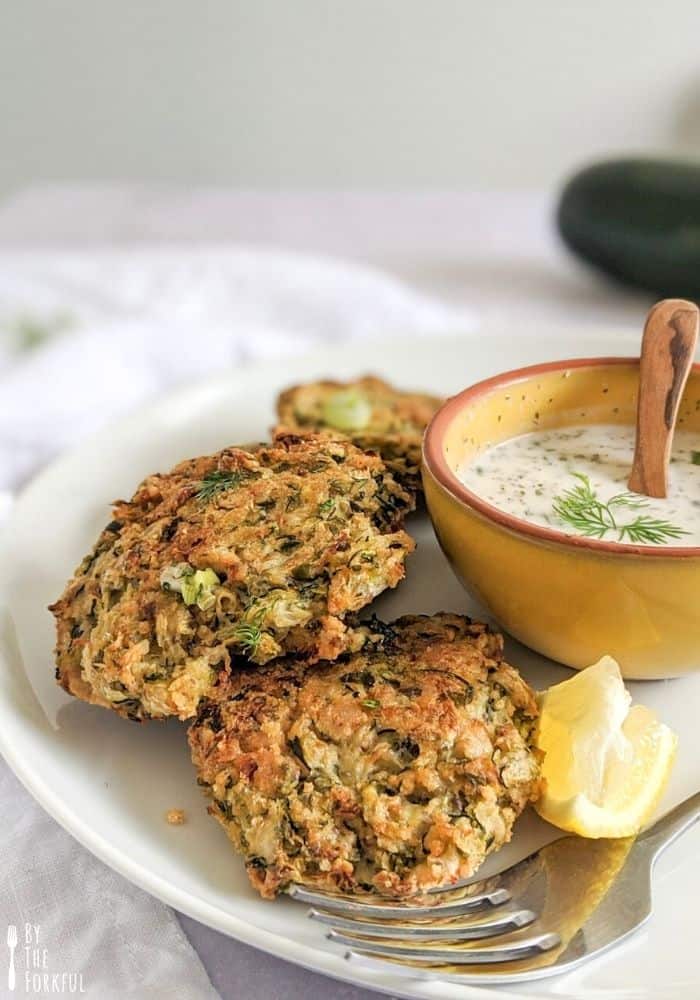 Courgette fritters served with vegan yoghurt
