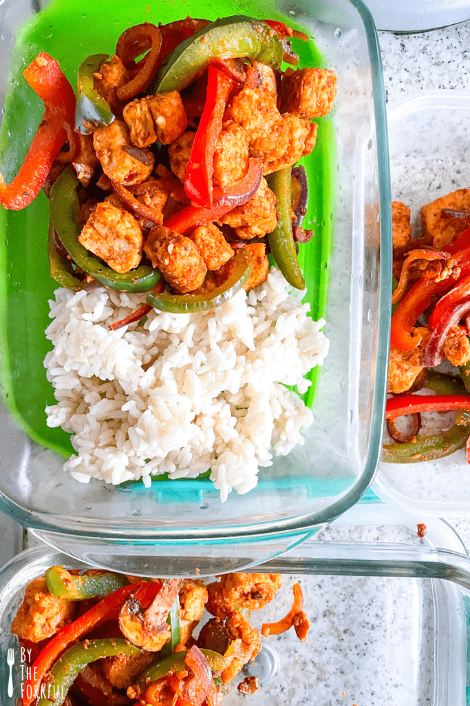 vegetarian chicken fajitas in a glass tupperware with rice