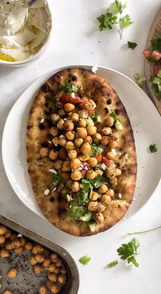 flatbread with shirazi salad and roasted chickpeas