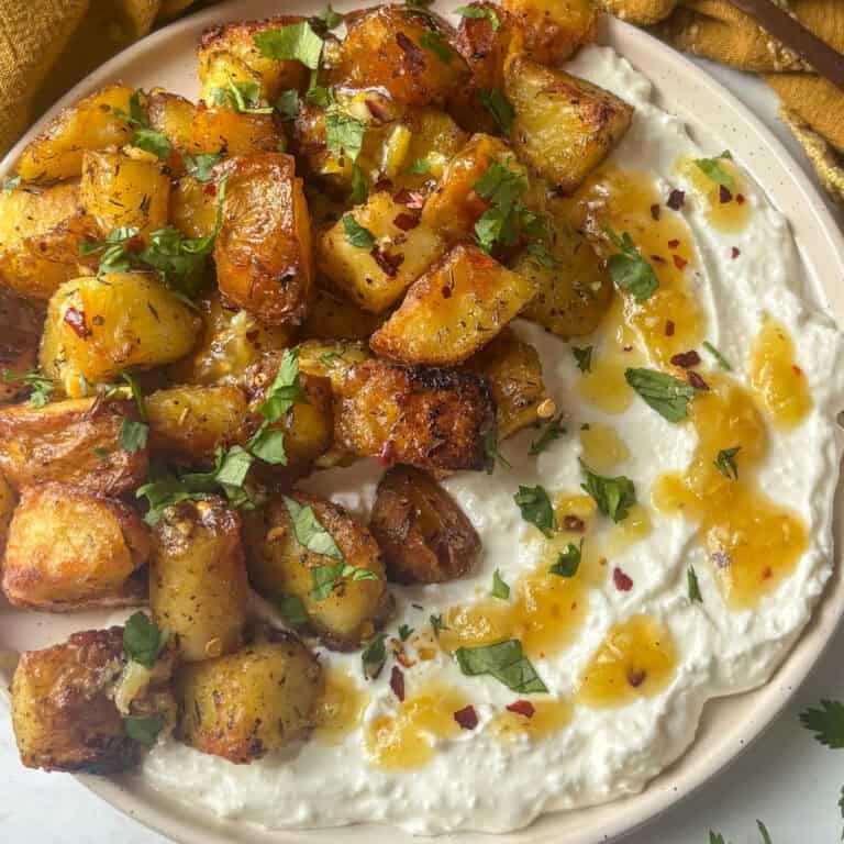 Greek roasted potatoes loaded on whipped feta