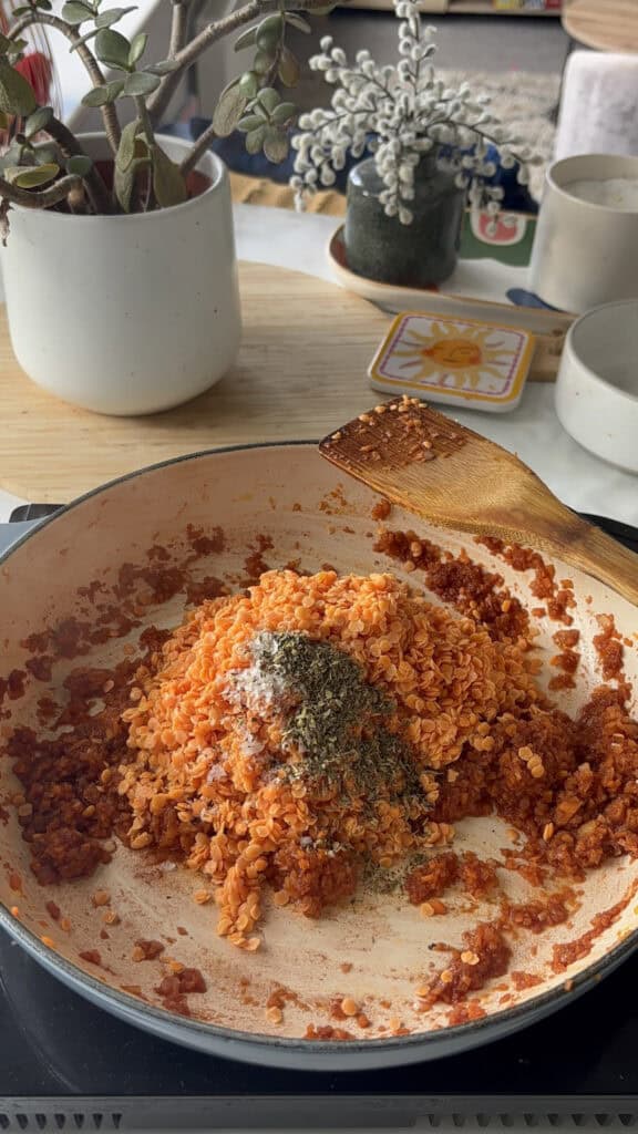 lentils and herbs added to the red wine ragu