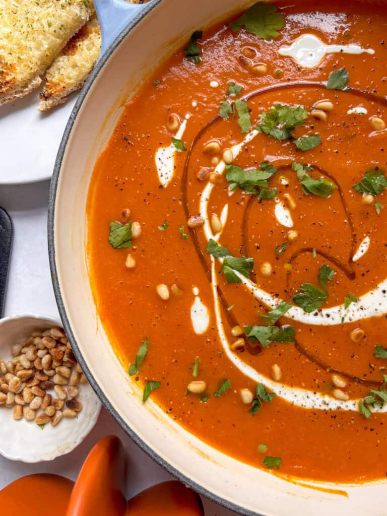 close up shot of red pepper and butternut squash soup