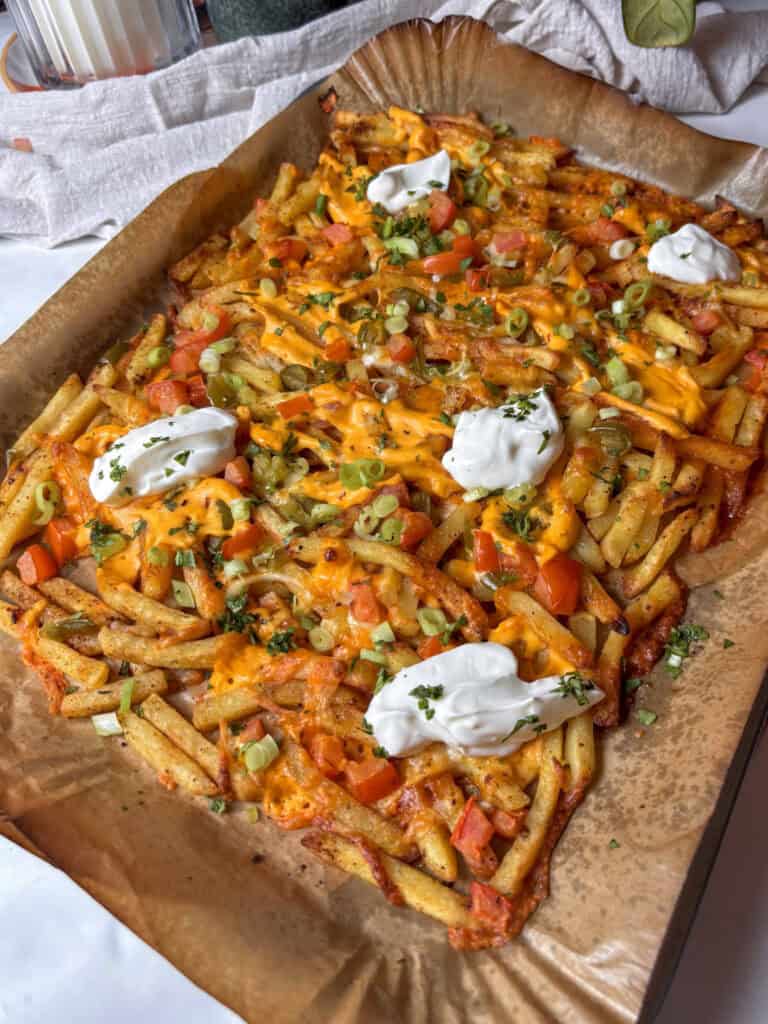 loaded dirty fries on a baking tray