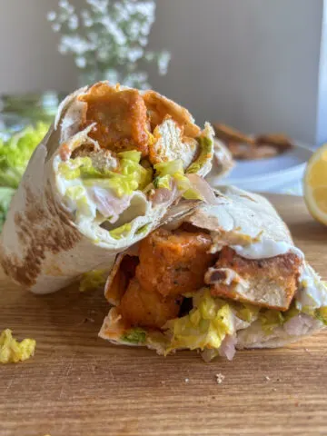 buffalo tofu wrap stacked on top of each other