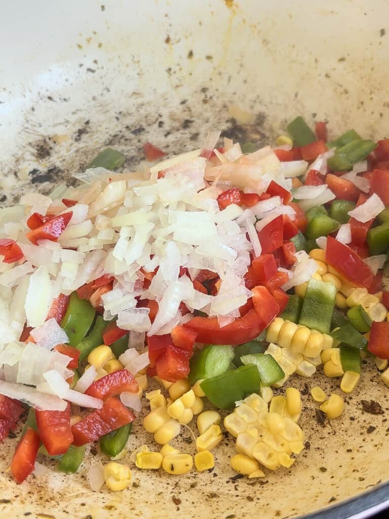 vegetarian taco bowl vegetables added to the pan