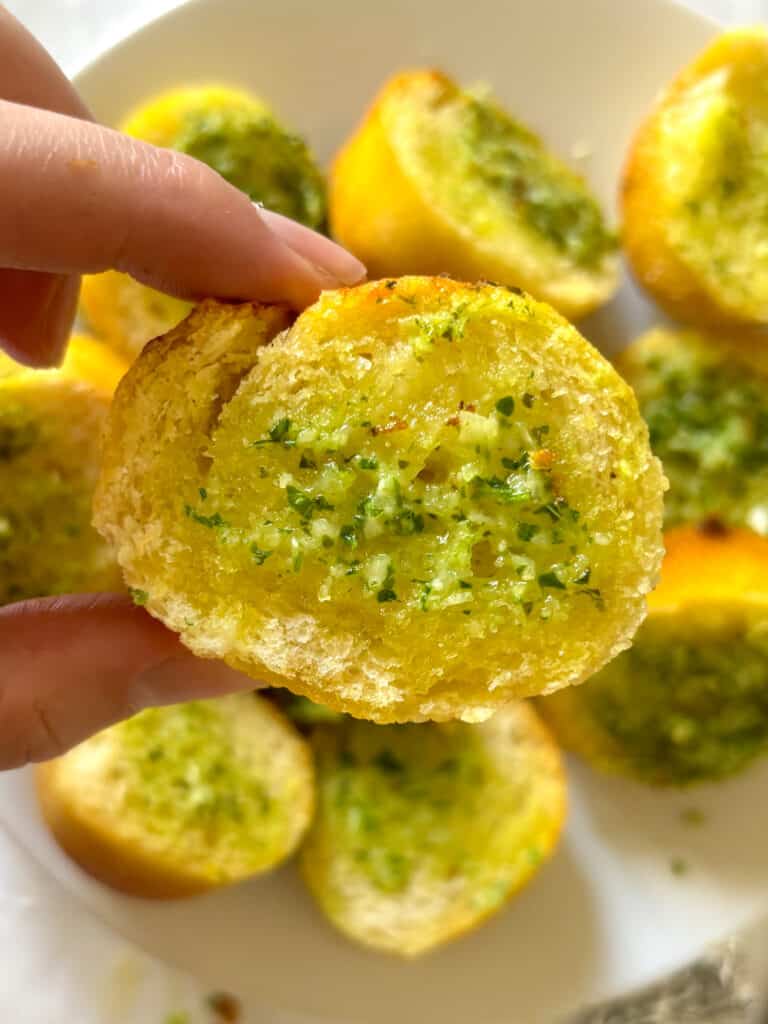 one slice of cooked baguette garlic bread