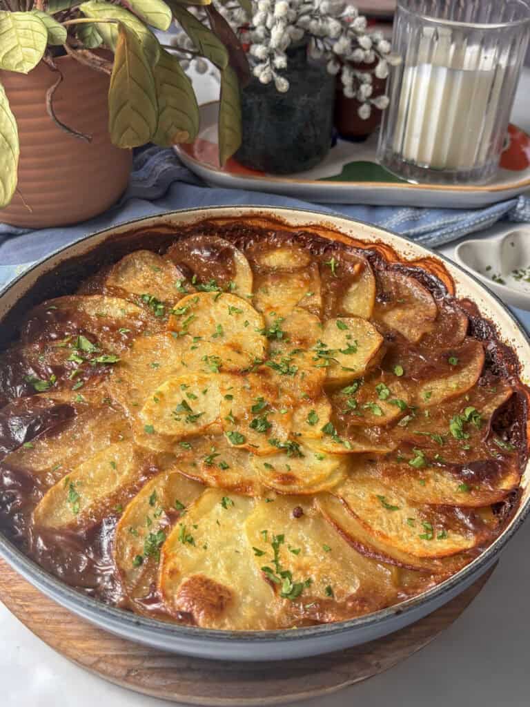 mushroom hotpot with potato topping in a casserole dish
