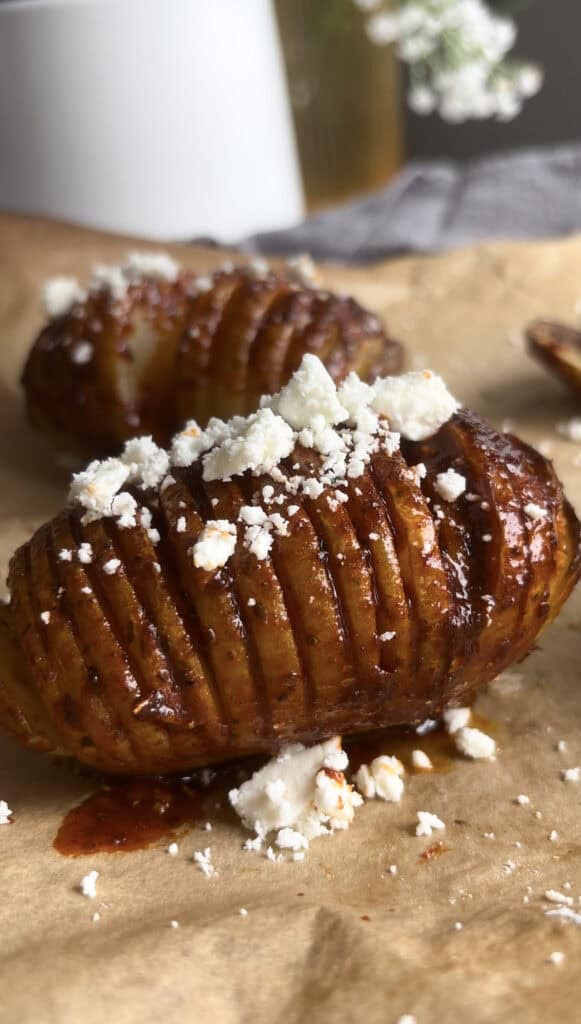 harissa hasselback potato sprinkled with feta