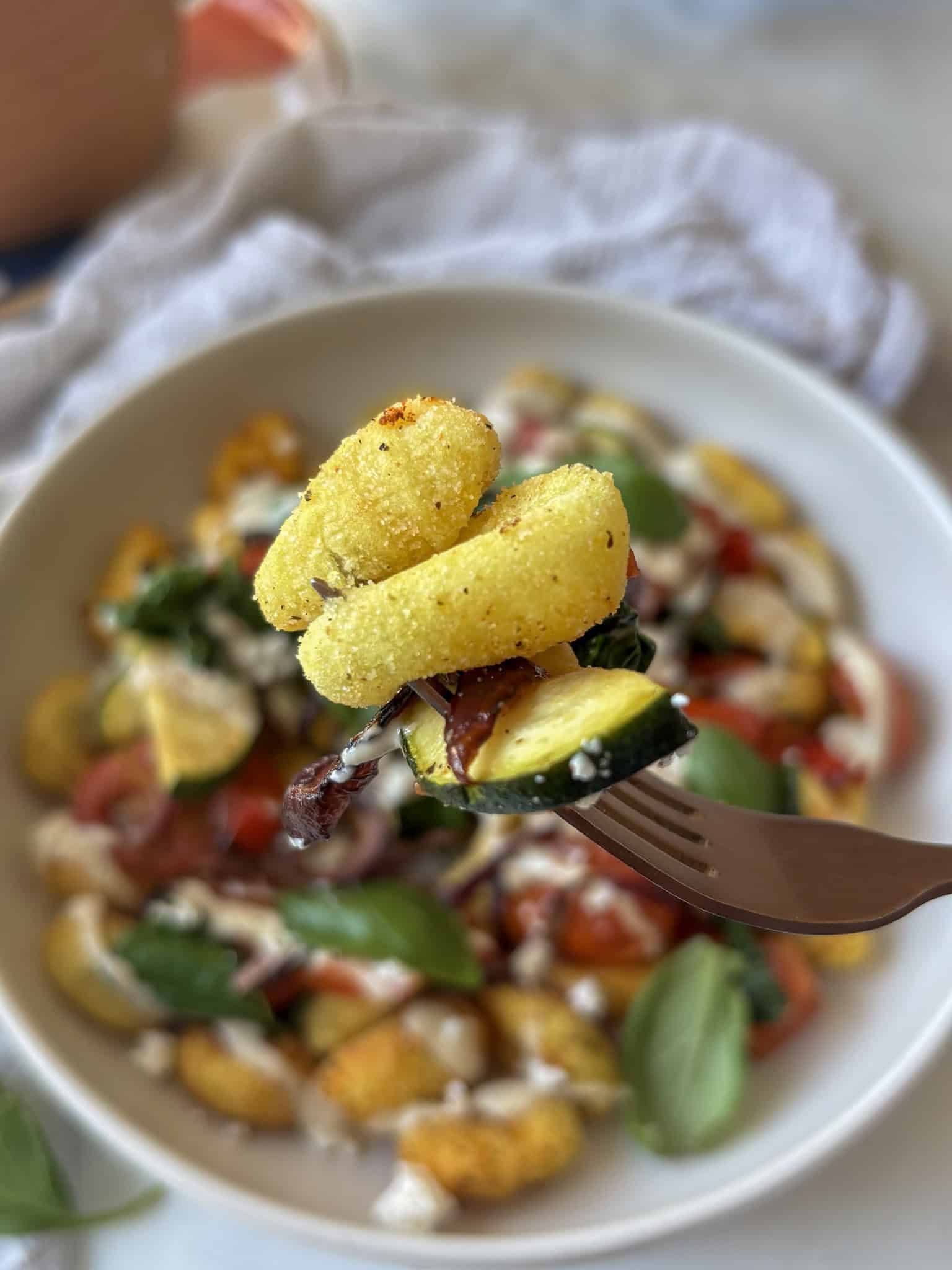 crispy baked gnocchi on a fork