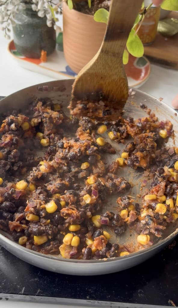 sweet potato black bean quesadilla mixture mixed together with ⅓ black beans mashed to create a thick texture