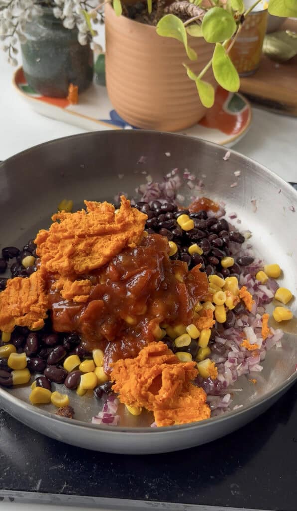 sweet potato black bean quesadilla mixture added to the pan