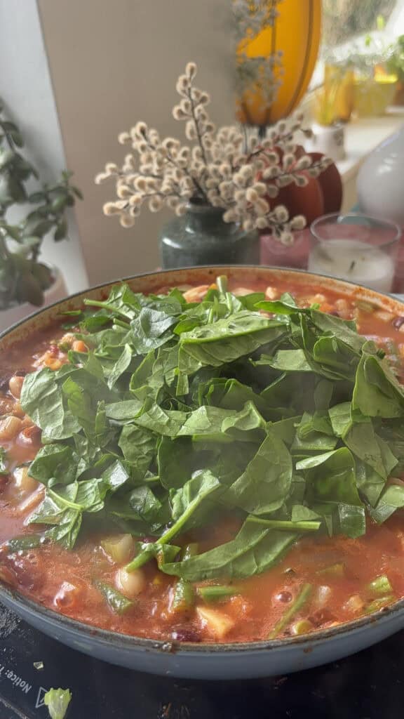 chopped fresh spinach is stirred through
