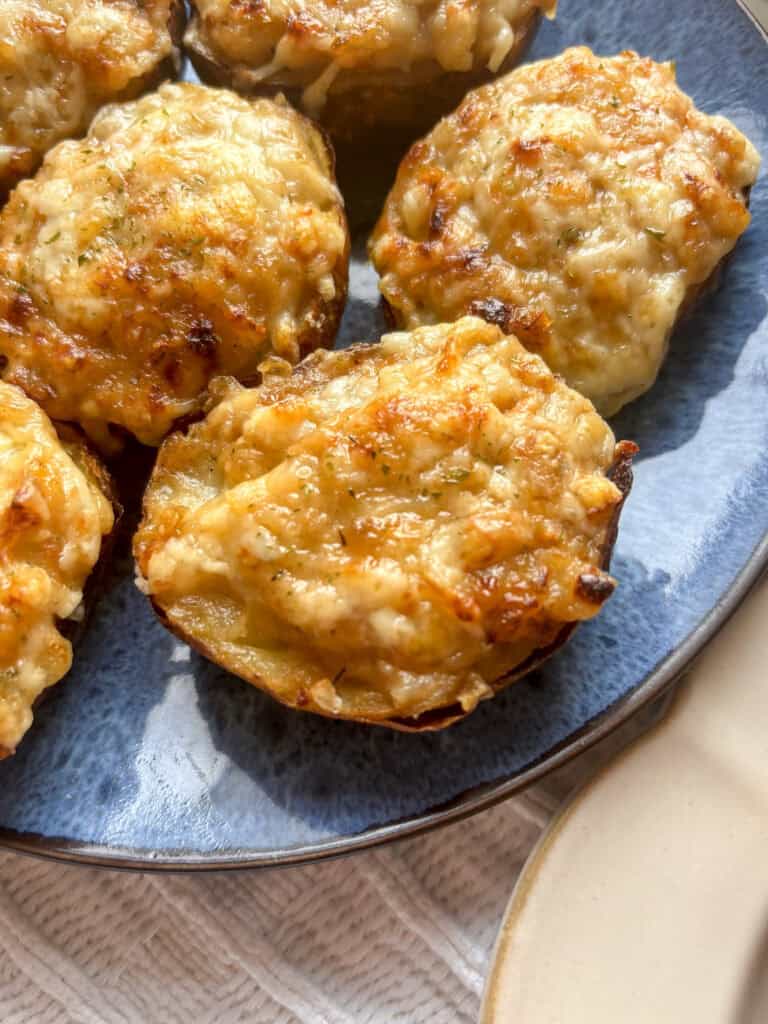 side on view of french onion loaded potato skins