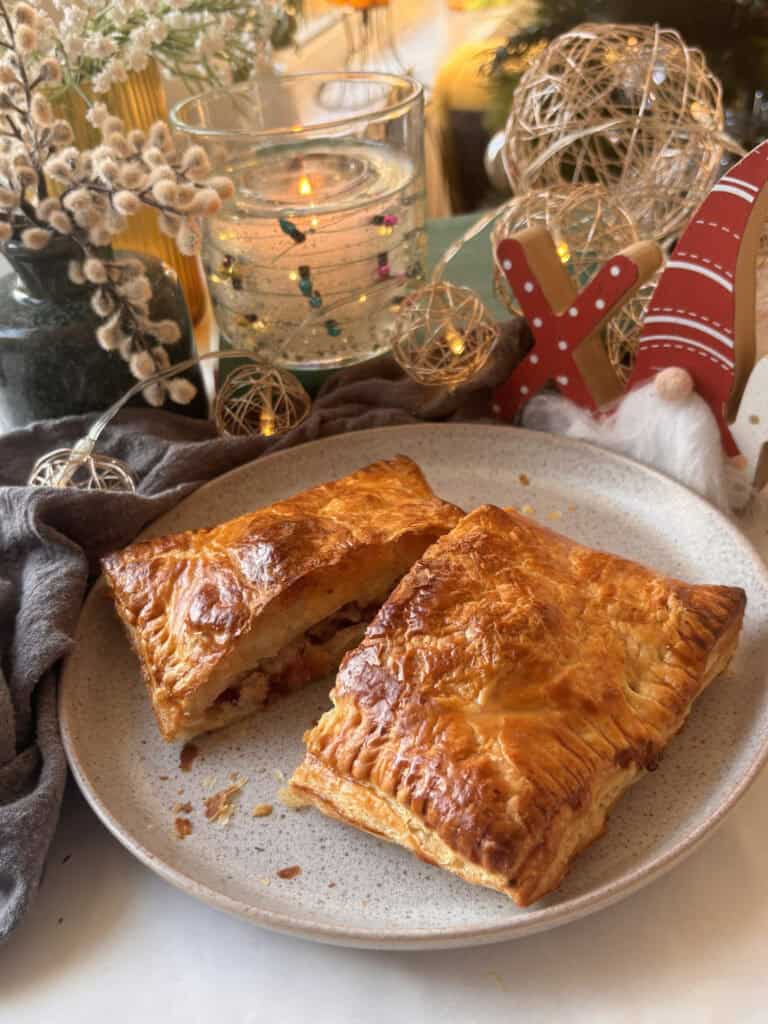 homemade gregg's festive bake on a plate, cut in half