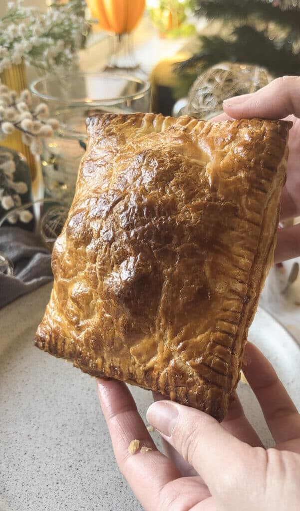 hand holding the homemade gregg's festive bake to demonstrate the size