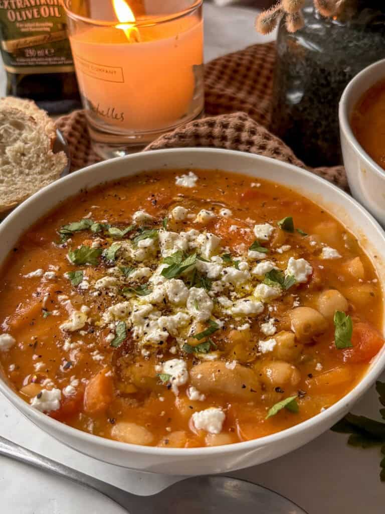 greek green beans - fasolakia - in a casserole pan. Potatoes and green beans simmered in a tomato sauce