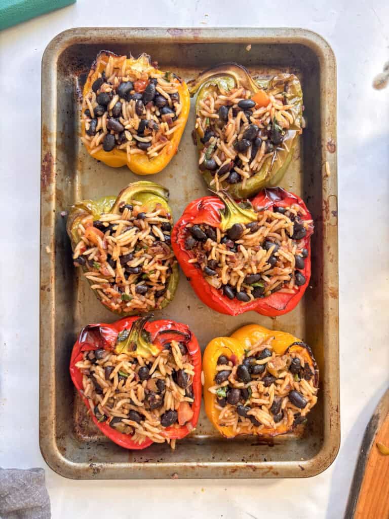 Mexican stuffed peppers ready for cheese topping and baking