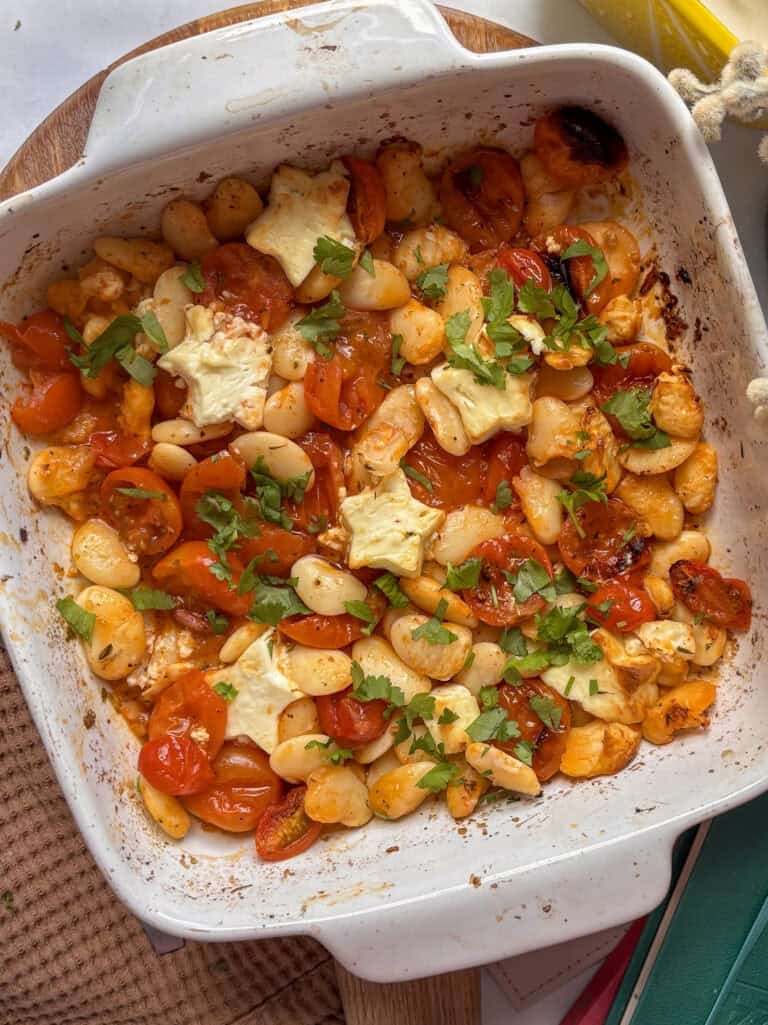 a baking dish of baked feta butter beans