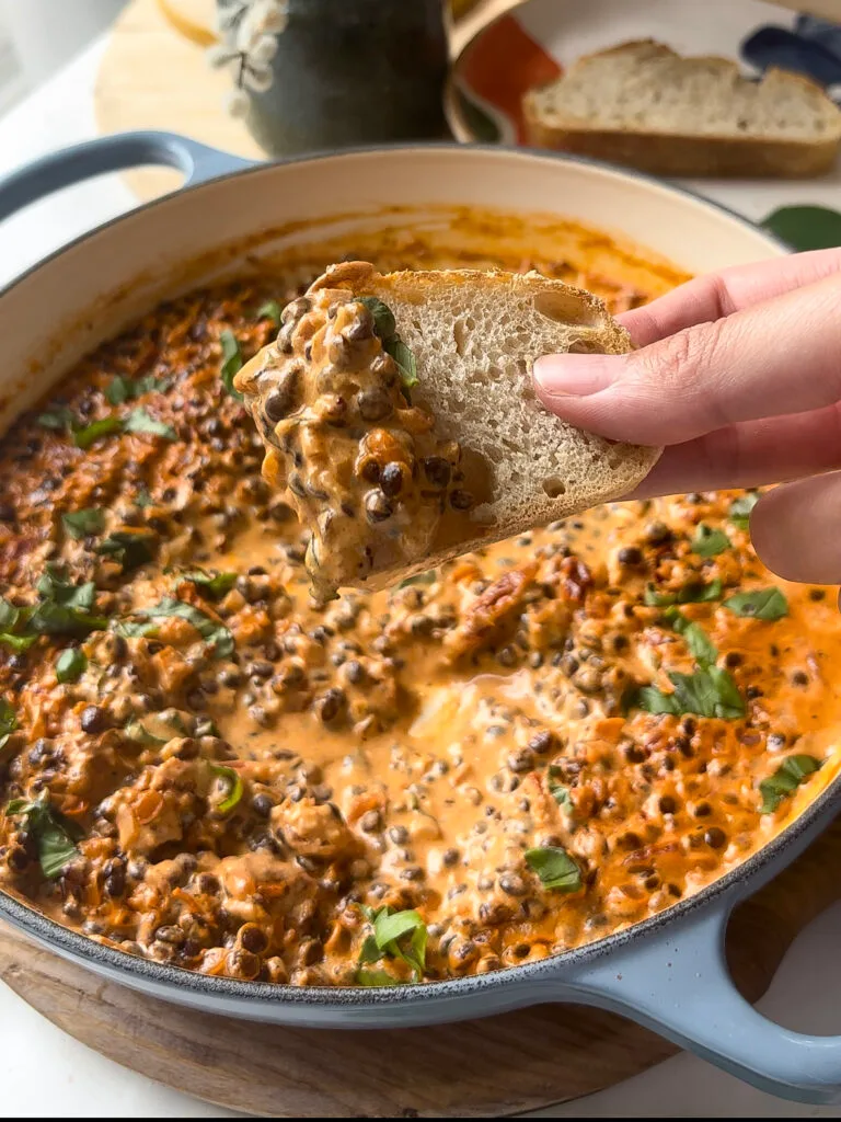creamy marry me lentils on a slice of sourdough