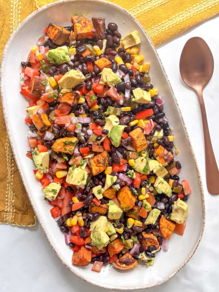 high protein black bean salad on a serving platter