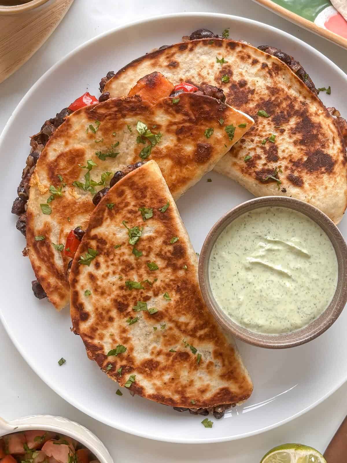 plate of black bean and sweet potato tacos