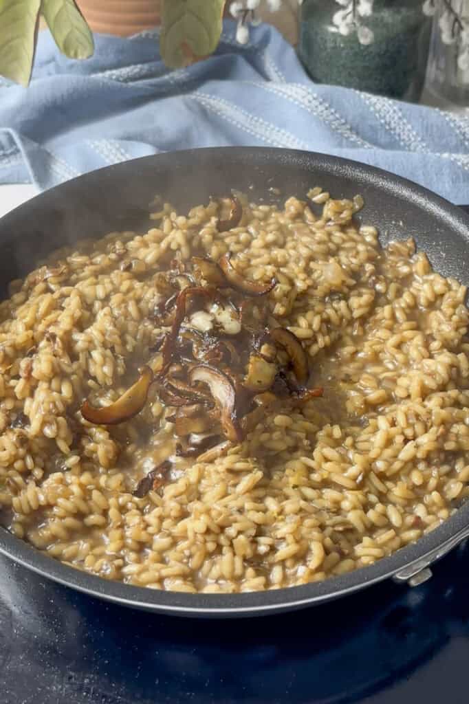 roasted mushrooms added to the cooked mushroom risotto