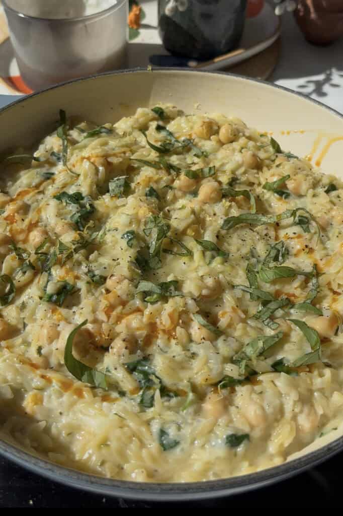 finish the lemon orzo with basil and more lemon zest and juice