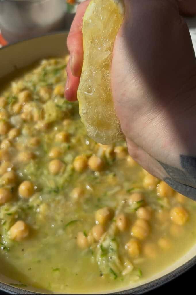 simmer the orzo and chickpeas in veg stock and lemon juice