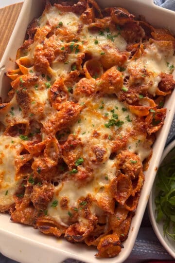 a casserole dish of creamy sausage pasta bake