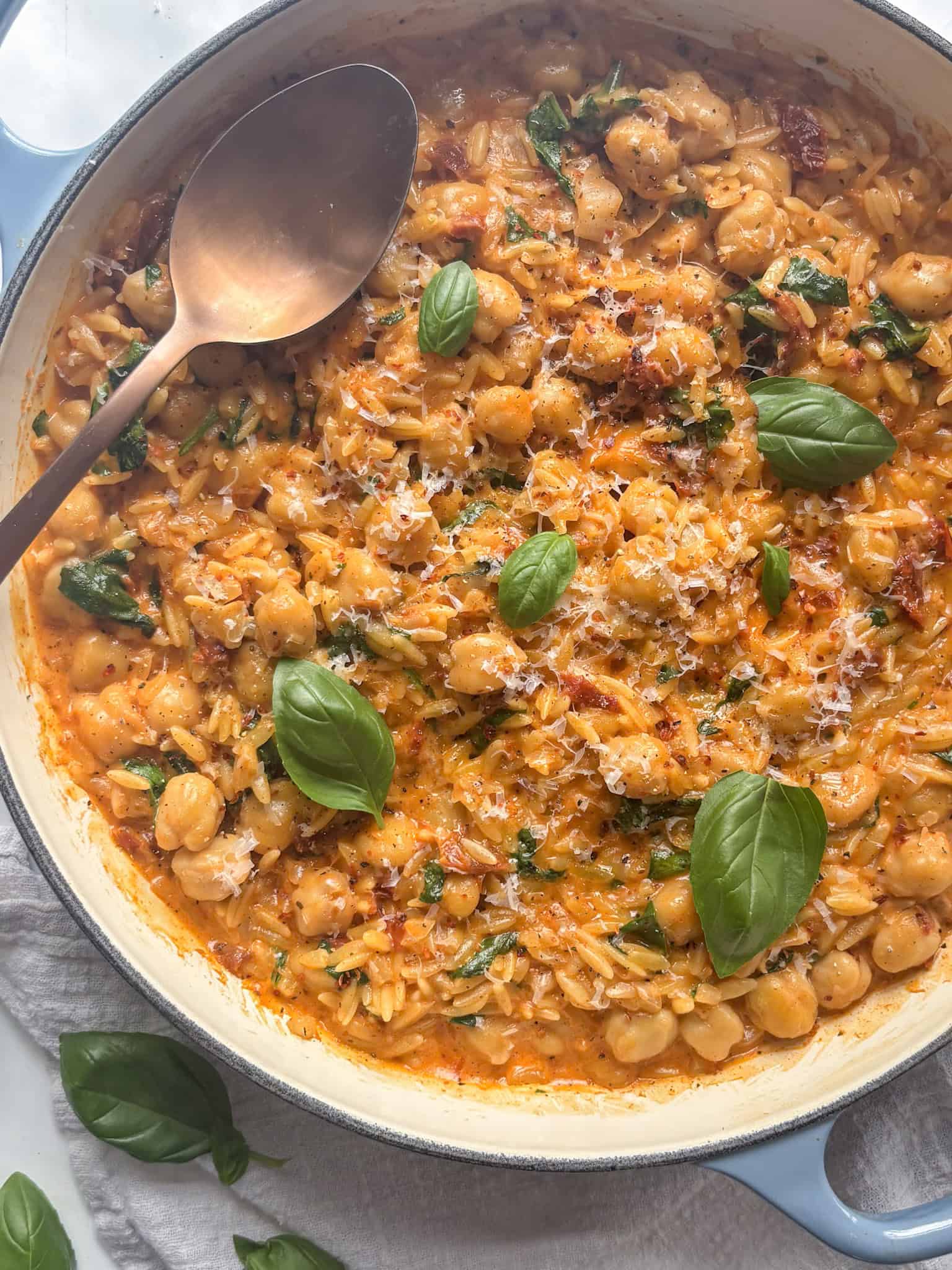 creamy marry me orzo with chickpeas, red pepper flakes, and fresh basil